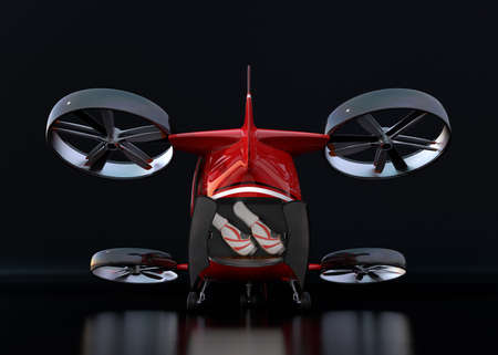 Rear view of Red Passenger Drone on black background. Rear hatch opened with two golf bags inside. 3D rendering image.の写真素材