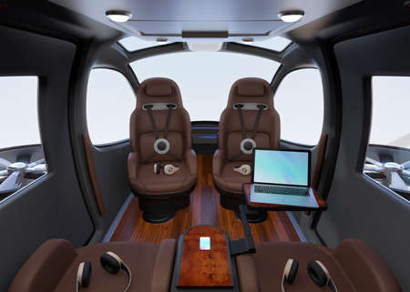 Passenger Drone Interior with front passenger seats turned backward. Headsets on each seats. Laptop PC on small table. 3D rendering image.の写真素材