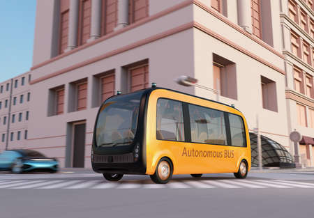 Yellow self-driving shuttle bus is driving through an intersection. 3D rendering image.の写真素材