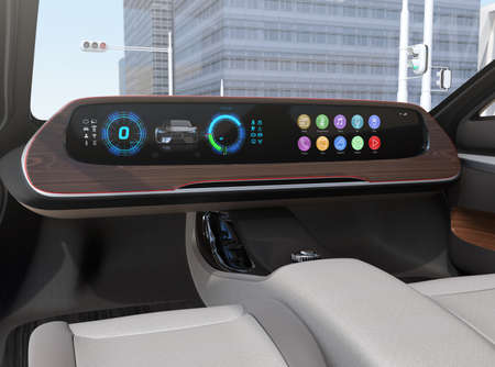 Autonomous electric car without steering and pedals stopped for waiting traffic signal.  Wide digital multimedia screen and icons in generic design. 3D rendering image.の写真素材