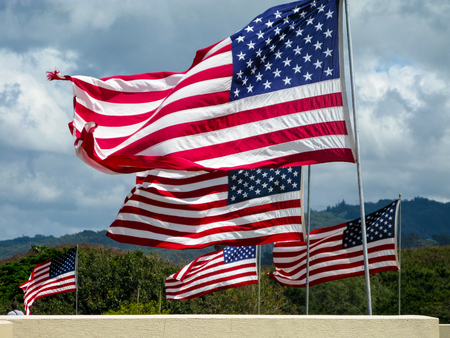 American flags flying over punchbowl crater memorialの写真素材