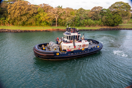 tug alongside preparing for canal transitの写真素材