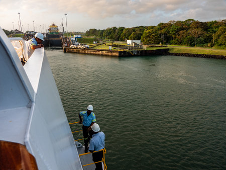 canal line handlers prepare to enter atlantic side lockの写真素材