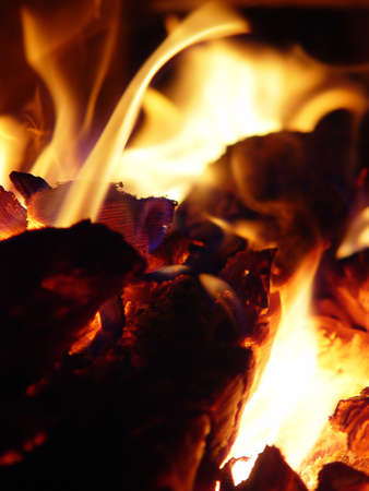 Charcoal burning a red flame in the furnaceの写真素材