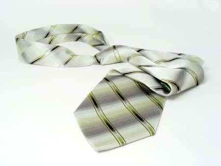 green isolated silk tie on the white background