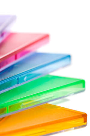 macro color stack of disc boxes with white backgroundの写真素材