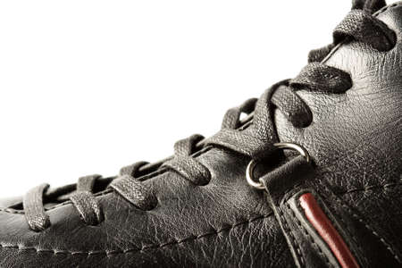 closeup black varnished leather shoe with seamsの写真素材