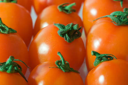 closeup group of red cherry tomatoesの写真素材