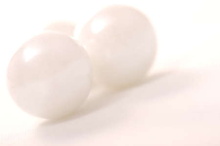 abstract blur toned background with glass balls, shallow DOF, copy space for the textの写真素材