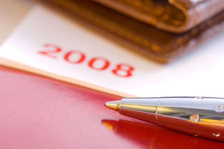 business closeup concept with metallic ball-pen, 2008 yearの写真素材