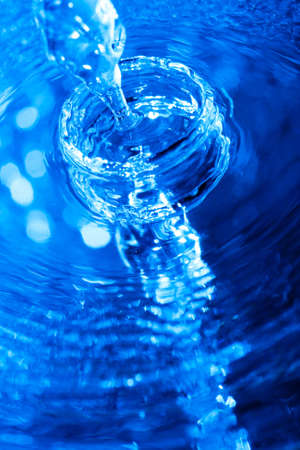flowing blue water backgroundの写真素材