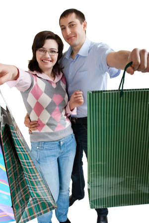 young adult couple shopping on white backgroundの写真素材