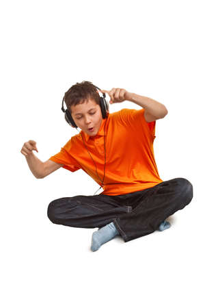 teenager boy listening to the musicの写真素材