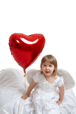 girl and heart balloon over whiteの写真素材