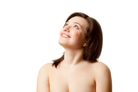 woman looking up and smiling over whiteの写真素材