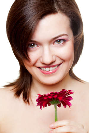 smiling woman potrait with gerberの写真素材