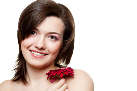 woman hold red gerber floswer over whiteの写真素材