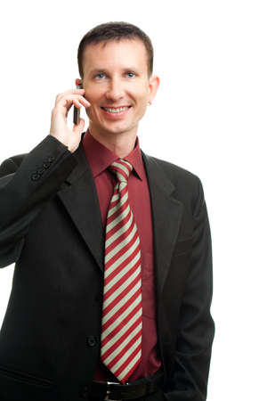 happy businessman calling by phone over whiteの写真素材