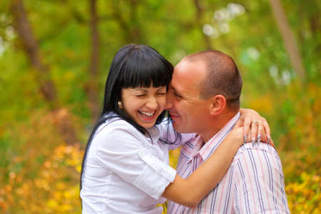 young lovely couple in the parkの写真素材