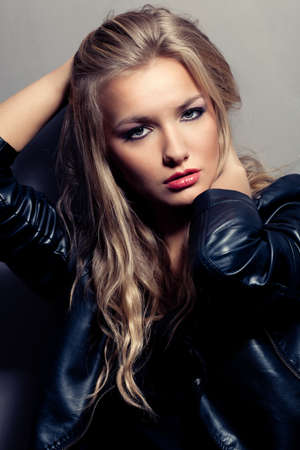closeup beautiful blonde woman portrait, rock styleの写真素材
