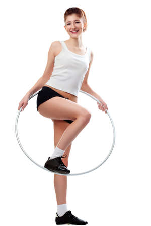 young woman with hoop over whiteの写真素材