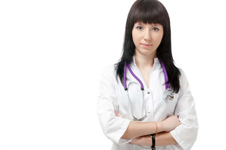 beautiful woman doctor with phonendoscope over whiteの写真素材