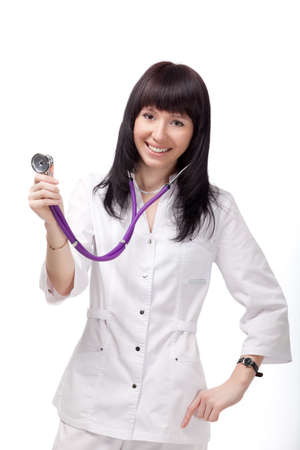 smiling woman doctor with stethoscope over whiteの写真素材