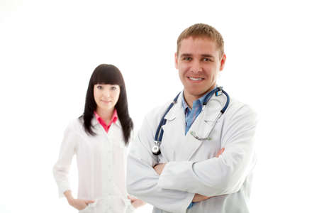 woman and man doctors over white backgroundの写真素材