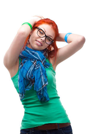 red haired girl with hands on head over whiteの写真素材