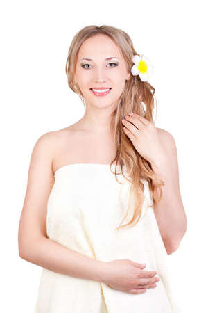 beautiful blond woman wearing towel , spa style over whiteの写真素材