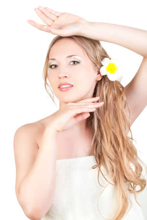 beautiful blond woman wearing towel , spa style over whiteの写真素材