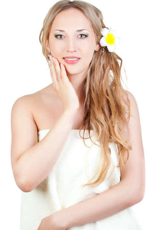 beautiful blond woman wearing towel , spa style over whiteの写真素材