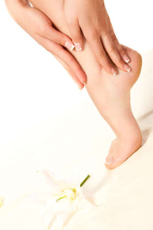 woman feet standing on towel, spa styleの写真素材
