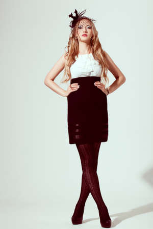 woman wearing retro syled dress,  studio shotの写真素材