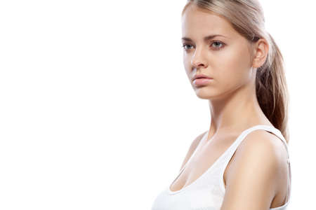 beautiful woman studio portrait over white backgroundの写真素材