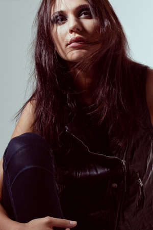beautiful woman rock style fashion studio portraitの写真素材