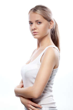 beautiful woman studio portrait over white backgroundの写真素材