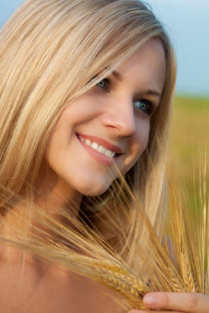 closeup beautiful woman face outdoors portraitの写真素材