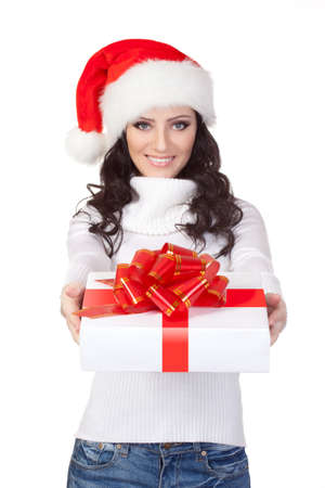 woman wearing christmas hat and holding gift box, isolatedの写真素材