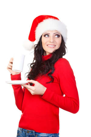 brunette woman holding a coffee mug and plateの写真素材