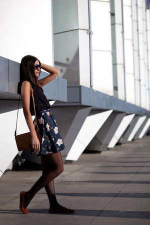 woman with leather bag, urban styleの写真素材