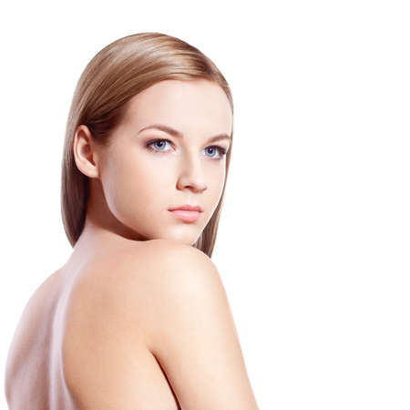 beautyful blond-brown woman face and shoulder over whiteの写真素材