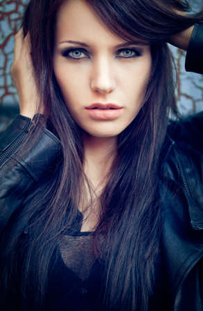 closeup beautiful brunette portrait. Specially toned fashion photoの写真素材