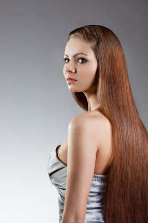 woman studio porrait with long hairの写真素材