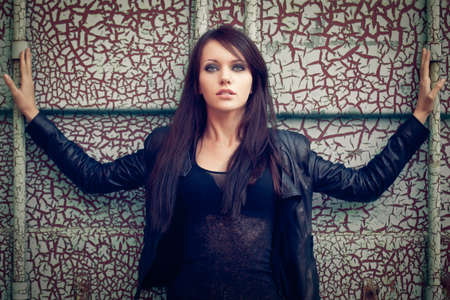 beautiful woman over cracked wallの写真素材