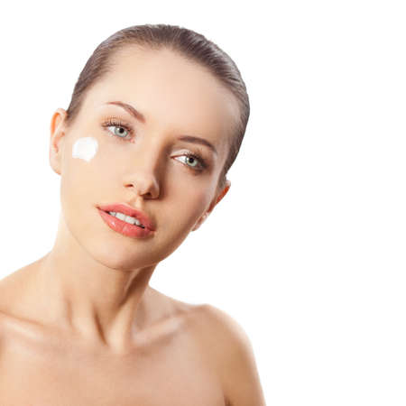 beautitful woman closeup face portrait with blue eyes over white backgroundの写真素材