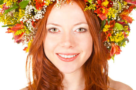 red haired woman closeup smiling face portrait with shallow dof の写真素材