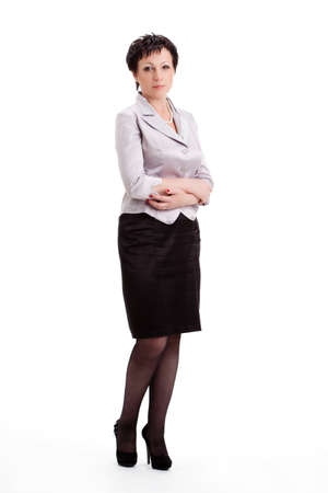 full lenght portrait of adult businesswoman over white backgroundの写真素材