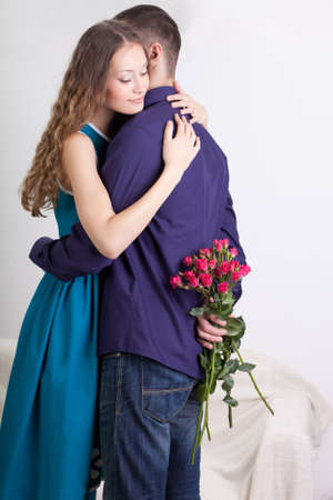 young man giving present to his girlfriendの写真素材