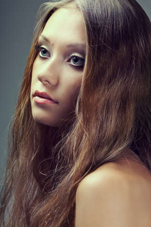 closeup beautiful woman face portrait looking awayの写真素材